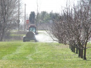 Tractor watering crops