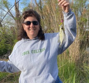 Person holding a fish